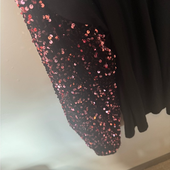New with tags black top with pink sequin sleeves. Soft t-shirt material. - Picture 2 of 4